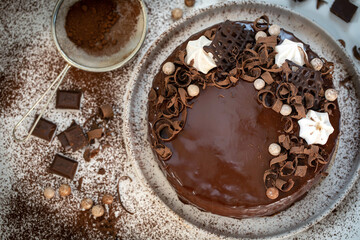 Chocolate cake with chocolate glaze and cream, 