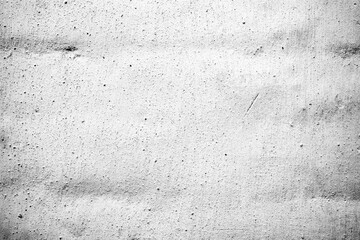 Texture of a concrete wall with cracks and scratches which can be used as a background