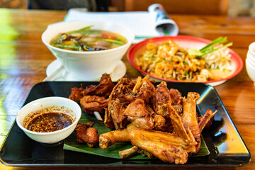 Fried chicken with spicy sauce, Thai style.