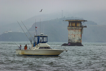 Fishing oat near Miles Rocks Lighthouse, San Francisco
