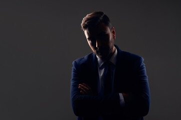 Close up portrait young man businessman. Caucasian guy business suit studio gray background.