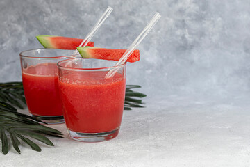 Watermelon pulp smoothie. Delicious red sliced watermelon on a plate. Stock of fiber and fructose....