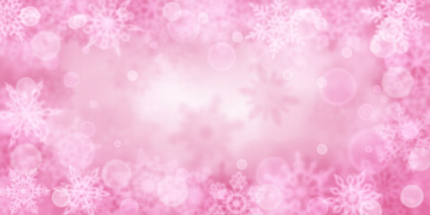 Christmas background of blurry snowflakes in pink colors