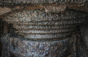 rusty suspension spring on an old caterpillar