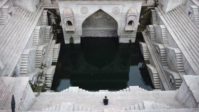 Toorji Ka Jhalra or Toorji&rsquo;s Step Well,Jodhpur, Rajasthan, India. Stepwells are wells in which the water is reached by descending a set of steps to the water level. Famous vintage Indian architecture.