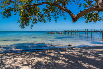 Summer scene in Florida Keys with white beach and tourqoise water