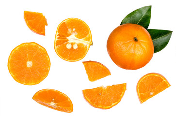 Slices of oranges with leaves isolated on white background. Flat lay, top view