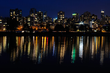 West End Vancouver skyline at twilight reflected in False Creek from Vanier Park