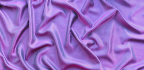The draped fabric is pink with a shimmer in blue.