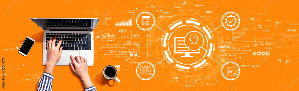 Poster document management system concept with person using a laptop computer