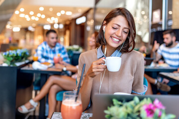 Young woman in cafe.