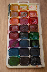 watercolor paints on white background