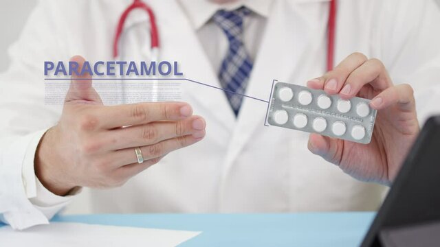 Paracetamol blister pack with tablets in doctor's hand