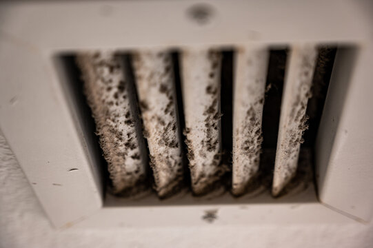 Subjective Focus On Lint And Dirt Particles On A Ceiling Air Vent