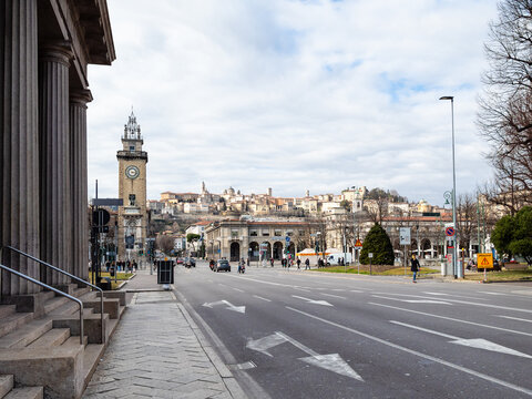 BERGAMO, ITALY - FEBRUARY 23, 2019: Porta Nuova and view of Largo Gianandrea Gavazzeni and Torre dei Caduti (Tower of the Fallen) in Lower Town (Citta Bassa) in Bergamo city