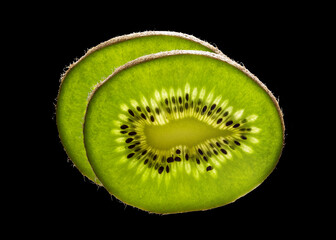 Fresh kiwi isolated on black background with clipping path