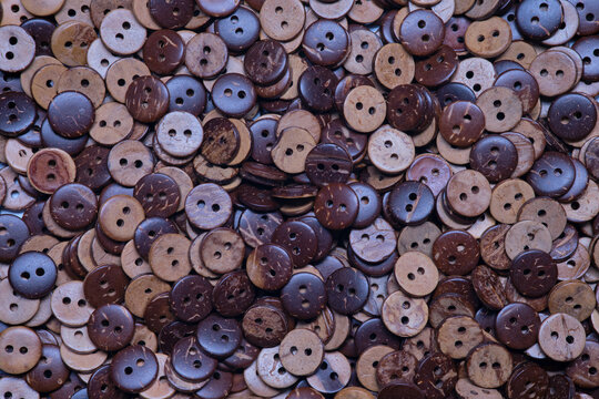 Various sewing Colorful coconut wooden buttons as background