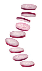 Red onion slices falling on white background