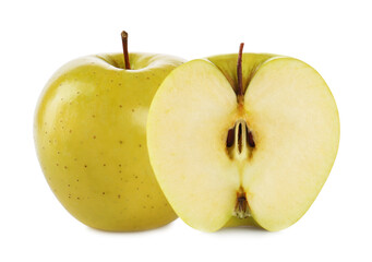 Cut and whole yellow apples on white background