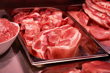 Quality raw meat showcase. Fresh and pink meat collection. Meat shop. Various and good product in the store.