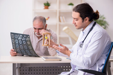 Male patient visiting doctor radiologist in time management conc