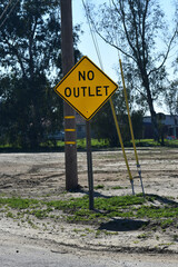 No outlet sign next to power lines