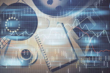Multi exposure of forex chart drawing and work table top veiw. Concept of financial analysis.