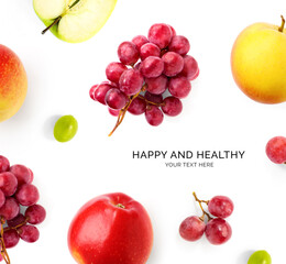 Creative happy and healthy card made of grapes and apples on the white background.  Grapes and apples happy new year, top view, festive greeting card.