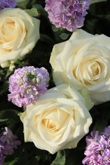 White and purple wedding centerpiece