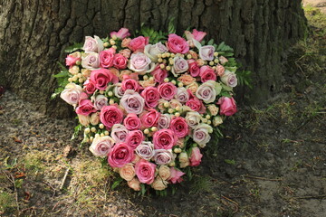 heart shaped sympathy flower arrangement