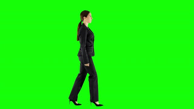 Serious Businesswoman Walking in Official Black Suit Green Screen Side View