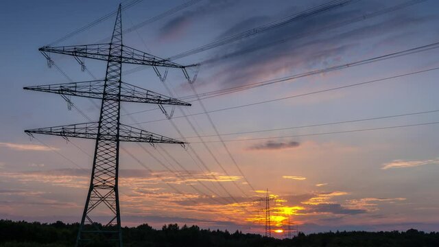 Power Line Timelapse with beautiful Sundown Zoom In