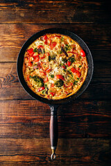 pizza on a wooden table