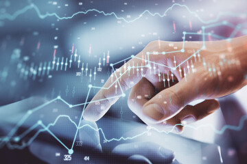 Multi exposure of man's hands holding and using a digital phone and forex graph drawing. Financial market concept.