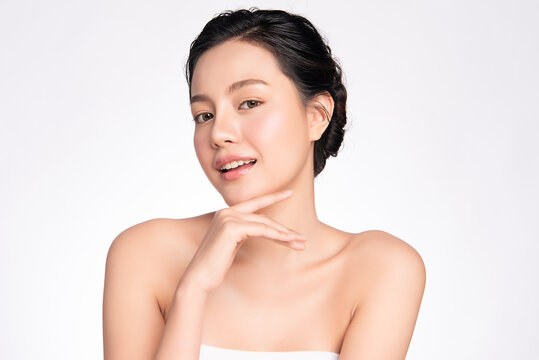 Beautiful Young asian Woman with Clean Fresh Skin, on white background, Face care, Facial treatment, Cosmetology, beauty and spa, Asian women portrait