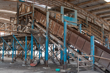 Fototapeta na wymiar Old abandoned recycling plant. Trash deposit. modern pollution concept.