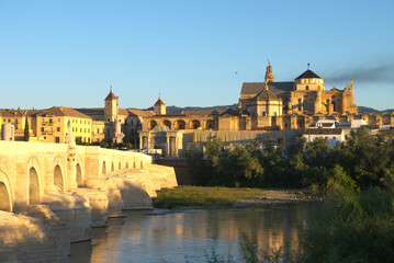 Fototapeta na wymiar Mezquita-Catedral and Puente Romano - Mosque-Cathedral and the Roman Bridge in Cordoba, Andalusia, Spain.