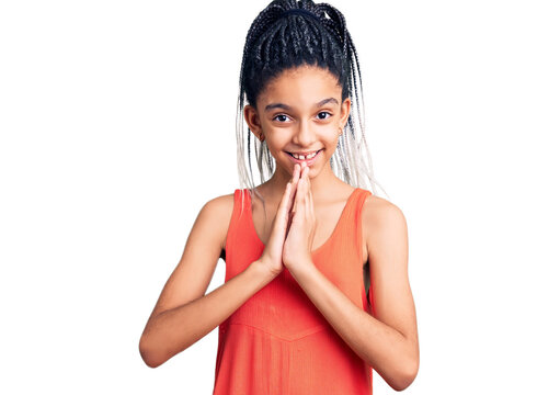 Cute african american girl wearing casual clothes praying with hands together asking for forgiveness smiling confident.