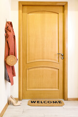Fototapeta na wymiar Interior of modern stylish hallway with door mat