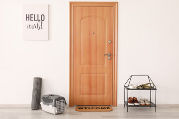 Interior of modern stylish hallway with door mat