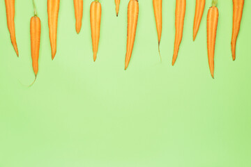 Cut fresh carrots on color background