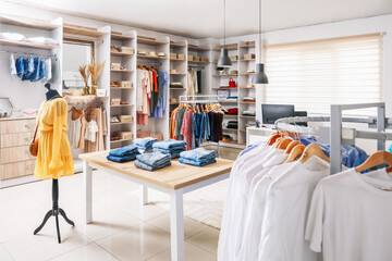 Stylish interior of modern clothes store