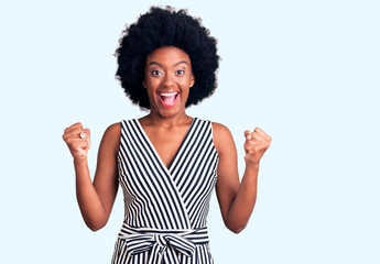 Young african american woman wearing casual clothes celebrating surprised and amazed for success with arms raised and open eyes. winner concept.