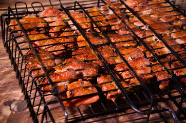 barbecue on the grill. Delicious shish kebab on wooden boards