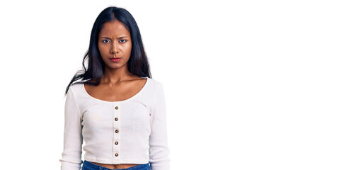 Young indian girl wearing casual clothes depressed and worry for distress, crying angry and afraid....