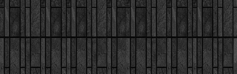 Panorama of Block pattern of black stone cladding wall tile texture and seamless background
