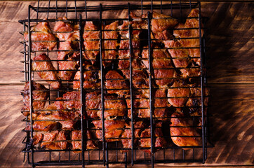 barbecue on the grill. Delicious shish kebab on wooden boards