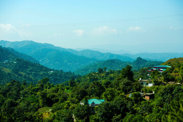 Naklejka na ściany i meble Beautiful view of hills and valleys of Naldehra (Shimla) Himachal Pradesh. 