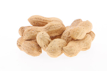 Peanuts stack in husk one broken with two seeds inside isolated on white background