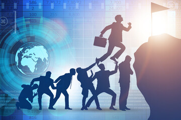 Career progression concept with businessman climbing stairs